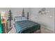 Bedroom featuring a comfortable bed, decor, and natural light creating a cozy and inviting atmosphere at 512 Teal Lake Dr, Holly Springs, NC 27540