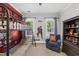 Themed ' bedroom with a bunk bed, a blue accent chair, and carpet at 517 Myrna Ln, Wake Forest, NC 27587