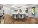 Modern basement kitchen area with a large island and bar stool seating at 517 Myrna Ln, Wake Forest, NC 27587