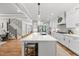 Spacious kitchen with a large center island, stainless steel appliances, and white cabinetry at 517 Myrna Ln, Wake Forest, NC 27587