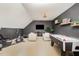 Spacious bonus room with exercise equipment, a TV area, and an air hockey table at 5216 Sunset Fairways Dr, Holly Springs, NC 27540