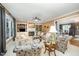 Inviting living room with a fireplace, built-in shelves, and comfortable seating at 5216 Sunset Fairways Dr, Holly Springs, NC 27540