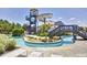 Water park featuring slides, lazy river, and lounge chairs at 5216 Sunset Fairways Dr, Holly Springs, NC 27540