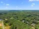 Expansive aerial view featuring the home and surrounding community, showcasing a beautiful landscape at 5300 Langdon Dr, Oxford, NC 27565