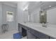 Bright bathroom with double vanity, marble floors, and an abundance of counter space at 5300 Langdon Dr, Oxford, NC 27565