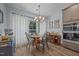 Charming dining area with natural light, a traditional table and a built in bar at 5300 Langdon Dr, Oxford, NC 27565