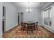 Charming dining room featuring a round table, rug, and elegant chandelier at 5300 Langdon Dr, Oxford, NC 27565