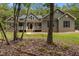 Charming home featuring a front porch with white railings and manicured yard at 5300 Langdon Dr, Oxford, NC 27565