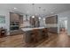Spacious kitchen with stainless steel appliances, large island, and pendant lighting at 5300 Langdon Dr, Oxford, NC 27565