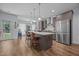 Modern kitchen featuring a large island, stainless steel appliances, and plenty of counter space at 5300 Langdon Dr, Oxford, NC 27565