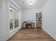 Bright office space with a large window for natural light and wood floors at 5300 Langdon Dr, Oxford, NC 27565
