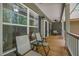 Inviting covered porch with comfortable seating, perfect for relaxing outdoors at 5300 Langdon Dr, Oxford, NC 27565