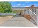 The backyard features a covered area, a concrete patio, and easy access from inside the home at 5328 Trackway Dr, Knightdale, NC 27545