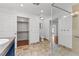 Bathroom featuring modern toilet, sleek vanity, and glass-enclosed shower at 5328 Trackway Dr, Knightdale, NC 27545
