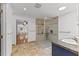 Bright bathroom featuring shower, sink vanity and tile flooring at 5328 Trackway Dr, Knightdale, NC 27545