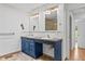 Bright bathroom features a double sink vanity and shower at 5328 Trackway Dr, Knightdale, NC 27545