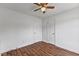 Bedroom showcasing hardwood floors and white doors, offering a clean and bright space at 5328 Trackway Dr, Knightdale, NC 27545