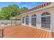 Inviting deck with a striped awning, ideal for relaxing and enjoying the outdoors at 5328 Trackway Dr, Knightdale, NC 27545