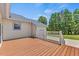Spacious deck with white railings, perfect for outdoor enjoyment and entertaining at 5328 Trackway Dr, Knightdale, NC 27545