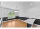 Dining room with natural light, neutral paint, and wood floors at 5328 Trackway Dr, Knightdale, NC 27545