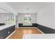 Dining room featuring natural light, neutral paint, and wood floors at 5328 Trackway Dr, Knightdale, NC 27545