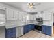 Kitchen featuring stainless appliances, white cabinets, and modern fixtures at 5328 Trackway Dr, Knightdale, NC 27545