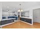Open kitchen with an island, stainless appliances, and fresh paint at 5328 Trackway Dr, Knightdale, NC 27545