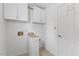 Laundry room with storage cabinets and washer/dryer hookups at 5328 Trackway Dr, Knightdale, NC 27545