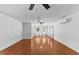 Open living area with hardwood floors, ceiling fans, and mini split, ready for customization at 5328 Trackway Dr, Knightdale, NC 27545