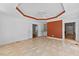 Spacious living room has neutral tones, large windows and ceiling fan at 5328 Trackway Dr, Knightdale, NC 27545