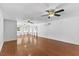 Spacious living room with hardwood floors, ceiling fans, and abundant natural light at 5328 Trackway Dr, Knightdale, NC 27545