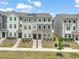 Townhome with Solar panels, front yard landscaping and sidewalk at 5430 Crescent Square St, Raleigh, NC 27616