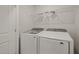 Laundry room featuring a washing machine and a dryer at 5430 Crescent Square St, Raleigh, NC 27616