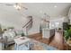 Open floorplan with living, dining, and kitchen space at 5430 Crescent Square St, Raleigh, NC 27616