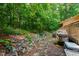 Stone-lined path along the back of the house at 60 Stoneridge Rd, Durham, NC 27705