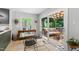 Cozy dining area adjacent to the outdoor deck with ample light and views of nature at 60 Stoneridge Rd, Durham, NC 27705