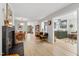Spacious living room with fireplace, views into the dining room, kitchen, and front entrance at 60 Stoneridge Rd, Durham, NC 27705