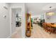 Spacious open-concept living space with a kitchen view, hardwood flooring, and ample natural light at 60 Stoneridge Rd, Durham, NC 27705