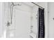 Shower includes shower head, seating, and curtain at 60 Stoneridge Rd, Durham, NC 27705