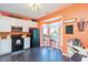 Vibrant kitchen with stainless steel appliances, dark floors, and a cozy breakfast nook by the bay window at 610 Walnut Woods Dr, Morrisville, NC 27560
