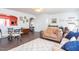 Spacious living room with hardwood floors, comfortable seating, and an open layout perfect for entertaining at 610 Walnut Woods Dr, Morrisville, NC 27560