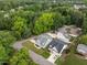Aerial shot of charming homes surrounded by lush greenery and trees at 622 Sunset Ave, Apex, NC 27502