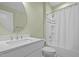 Bathroom featuring modern fixtures, a subway tile shower, and a vanity at 622 Sunset Ave, Apex, NC 27502
