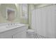 Bathroom vanity with a shower and modern fixtures at 622 Sunset Ave, Apex, NC 27502