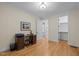Bedroom featuring a desk, chair, and oak hardwood floors providing ample space at 622 Sunset Ave, Apex, NC 27502
