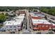 Overhead view of a charming downtown area featuring a mix of brick buildings, pedestrian crosswalks, and historic storefronts at 622 Sunset Ave, Apex, NC 27502