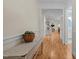Welcoming entryway with hardwood floors, elegant trim, and a view into the home at 622 Sunset Ave, Apex, NC 27502