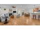 Spacious living room with hardwood floors, fireplace, and abundant natural light at 622 Sunset Ave, Apex, NC 27502