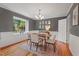 Inviting dining room with a large window, natural light, and stylish decor at 6304 Ansley Ln, Raleigh, NC 27612