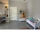 Bright mud room features a storage bench, coat rack, and easy access to the front door and stairs at 6304 Ansley Ln, Raleigh, NC 27612